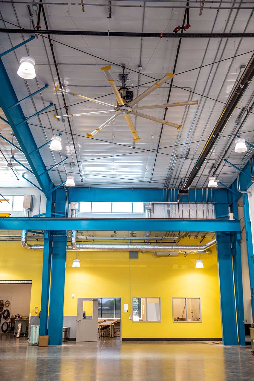 Commercial fan installed on ceiling of building